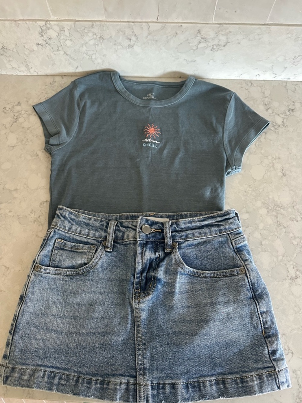 RSQ girls light blue denim skirt and O’Neil short sleeve tee